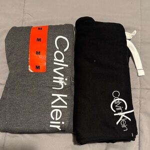 NEW! 2 Calvin Klein Charcoal and Black Jogger pants.